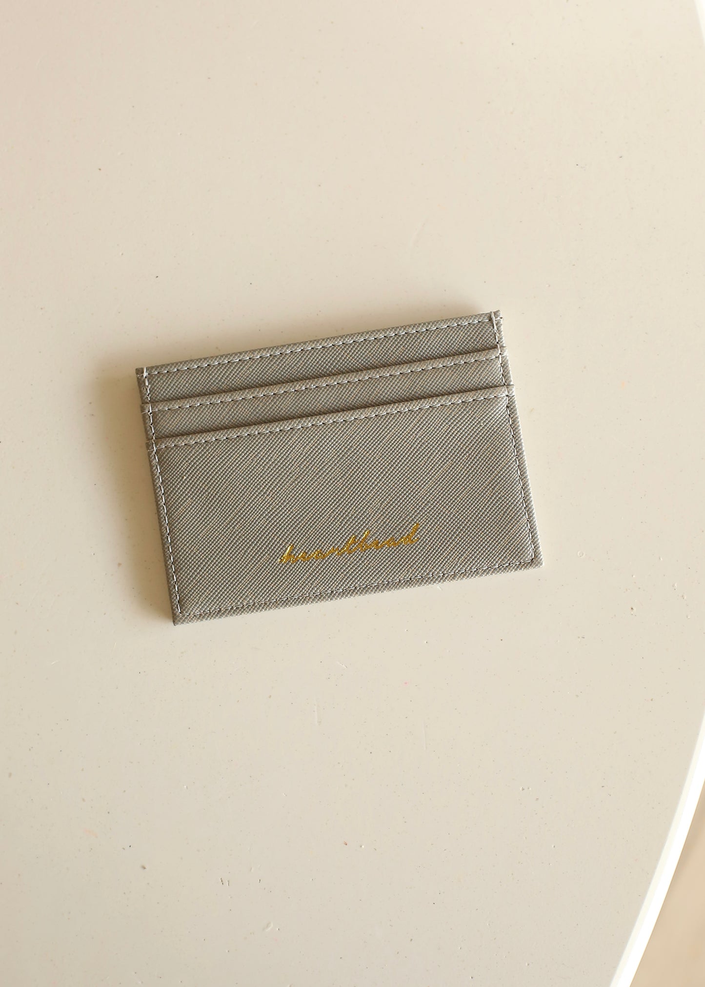 HEARTBEAD cardholder (dark cloud)