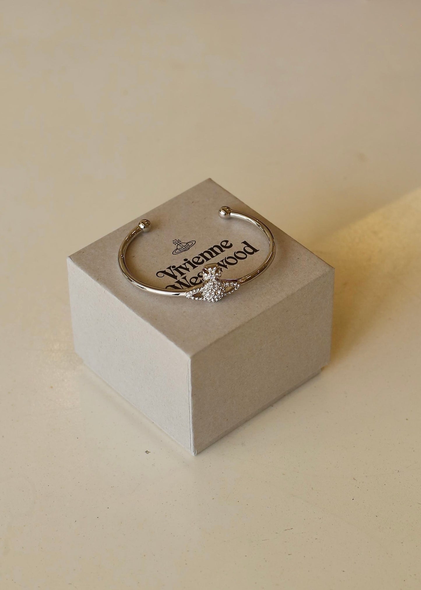 VIVIENNE WESTWOOD Grace Bas Relief Brass Bangle