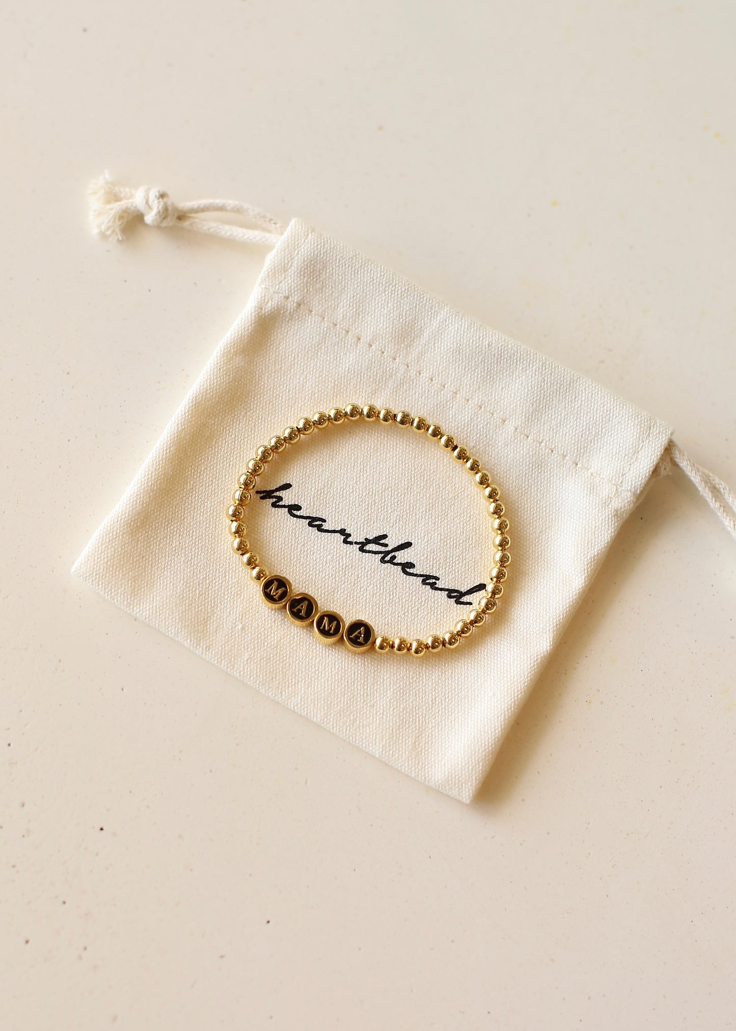 MAMA goldbeaded bracelet