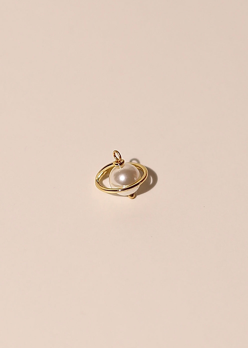 SATURN charm