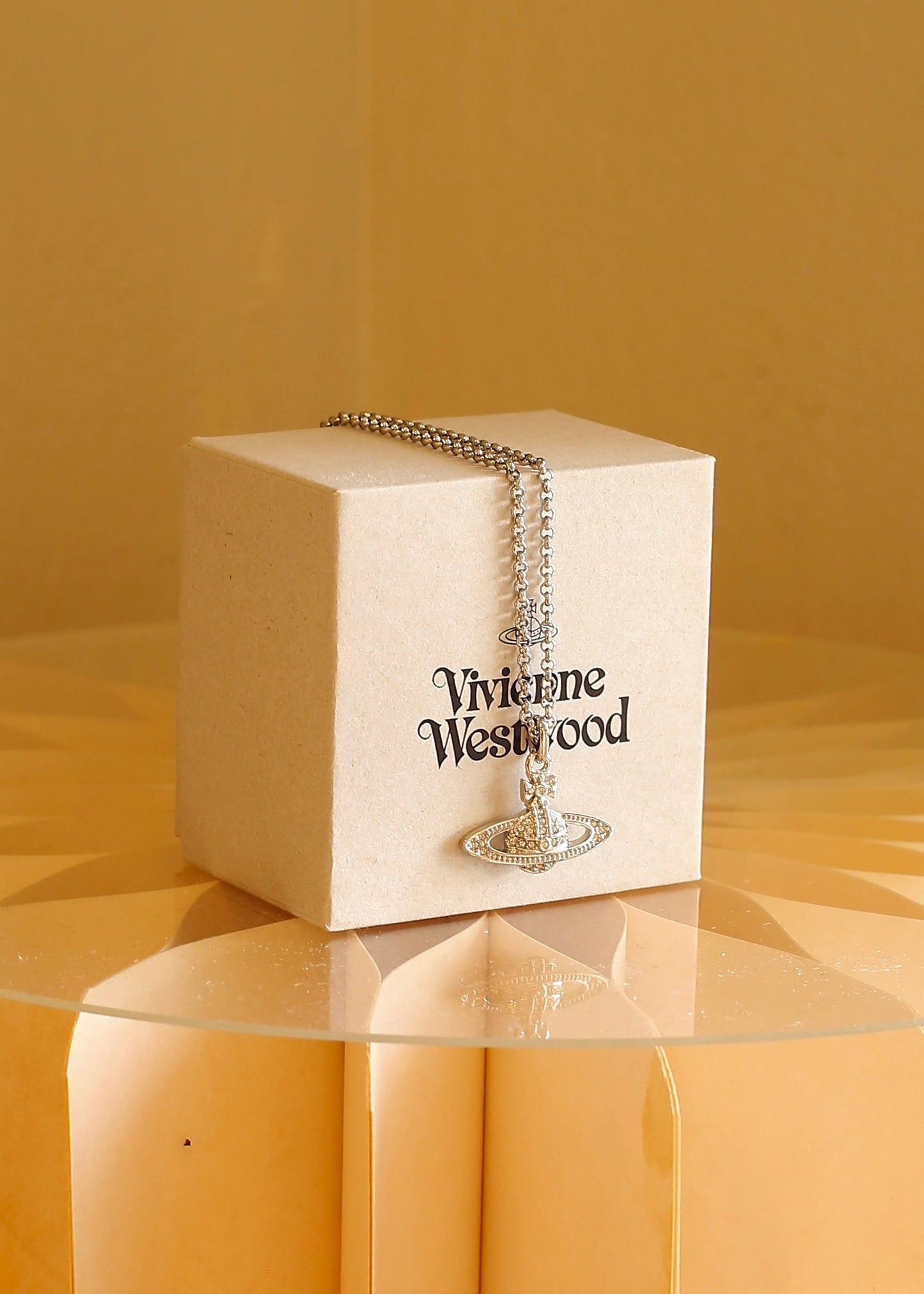 INSTOCK VIVIENNE WESTWOOD Bas relief orb mini platinum brass